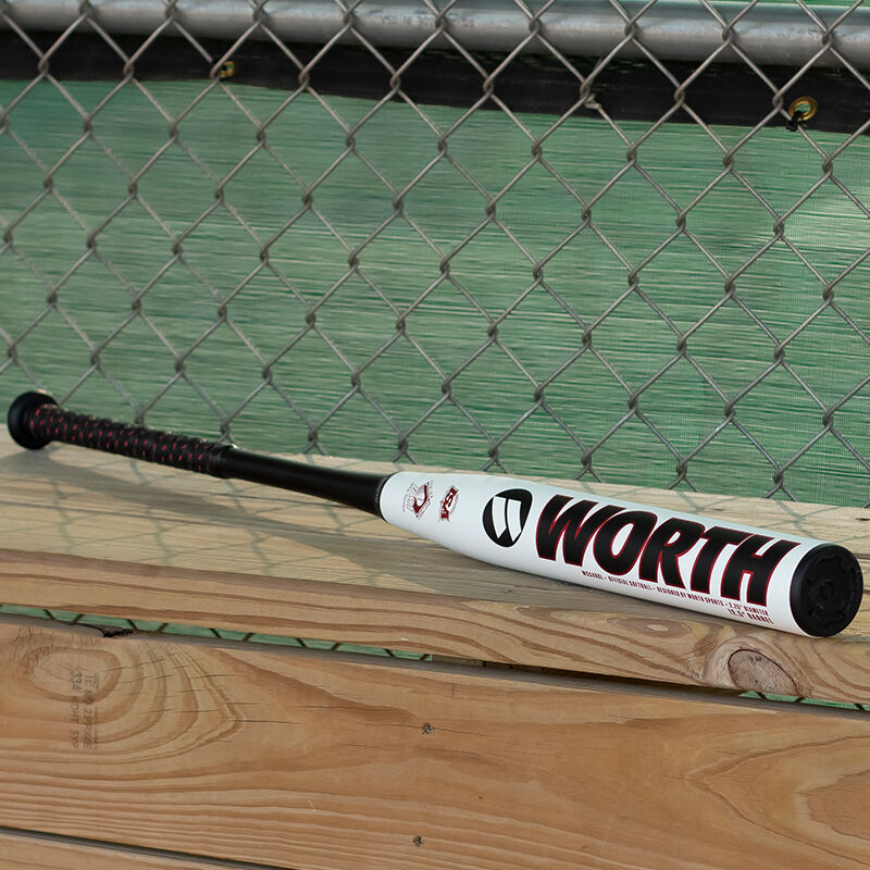 A KReCHeR Gamer Series senior bat on top of a bench in a dugout showing the Worth logo - SKU: WSS4KGL