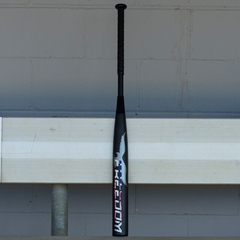 A dark grey Freedom USA bat standing on a bench - SKU: WSA3FRB